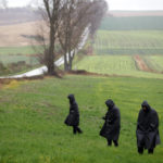 
              Police officers check and secure an area outside a grain depot where, according to the Polish government, an explosion of a Russian-made missile killed people, in Przewodow, Poland, Wednesday, Nov. 16, 2022. Poland said Wednesday that a Russian-made missile fell in the country's east, killing a few people, though U.S. President Joe Biden said it was "unlikely" it was fired from Russia. (AP Photo/Michal Dyjuk)
            