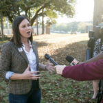 
              U.S. Senate candidate Katie Britt talks to the media after voting at Huntingdon College in Montgomery, Ala., on Tuesday, Nov. 8, 2022. (Jake Crandall/The Montgomery Advertiser via AP)
            