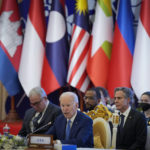 
              U.S. President Joe Biden, foreground, speaks during the ASEAN - U.S. summit in Phnom Penh, Cambodia, Saturday, Nov. 12, 2022. (AP Photo/Vincent Thian)
            