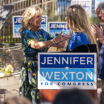 
              First lady Jill Biden, left, hugs Rep. Jennifer Wexton, D-Va., right, next to Sen. Tim Kaine, D-Va., at an event for Wexton in Ashburn, Va., Monday, Nov. 7, 2022. (AP Photo/Jacquelyn Martin)
            