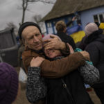 
              In the village of Tsentralne, Ukrainian family members are reunited for the first time since Russian troops withdrew from the Kherson region, southern Ukraine, Sunday, Nov. 13, 2022. Families were torn apart when Russia invaded in February, as some fled and others hunkered down. Now many are seeing one another for the first time in months, after Moscow's latest retreat amid a Ukrainian counteroffensive that has retaken a pocket of territory wedged between the regional capitals of Kherson and Mykolaiv and the Black Sea. (AP Photo/Bernat Armangue)
            