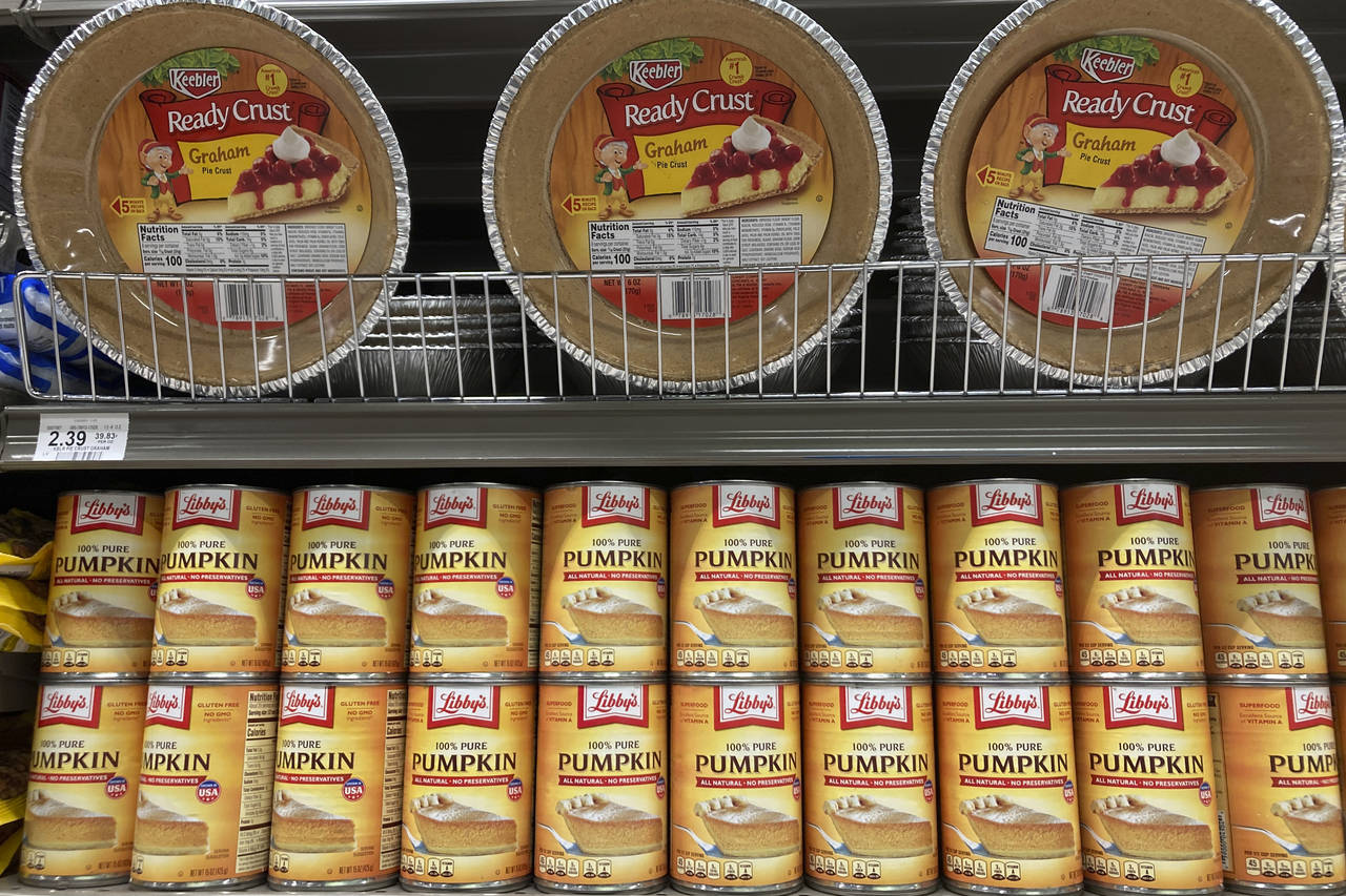 File - Canned pumpkin and graham cracker shell crusts are displayed at a Publix Supermarket, Tuesda...