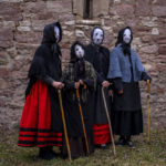 
              Revelers dressed as "Mascaritas" take part in a traditional carnival celebration in the small village of Luzon, Spain, on Feb. 26, 2022. Preserved records from the fourteenth century document Luzon's carnival, but the real origin of the tradition could be much older. (AP Photo/Manu Fernandez)
            