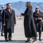 
              U.S. Sen. Ben Ray Lujan, left, and Gov. Michelle Lujan Grisham, right, greet Vice President Kamala Harris after she landed at Kirtland Air Force Base in Albuquerque, N.M., Tuesday, Oct. 25, 2022. Harris is in New Mexico to take part in a fundraiser, then she will participate a IN conversation on reproductive rights. ( Eddie Moore/The Albuquerque Journal via AP)
            