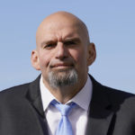 
              FILE - Pennsylvania Lt. Gov. John Fetterman, a Democratic candidate for U.S. Senate, stands on the tarmac after greeting President Joe Biden, on Oct. 20, 2022, at the 171st Air Refueling Wing at Pittsburgh International Airport in Coraopolis, Pa. (AP Photo/Patrick Semansky, File)
            
