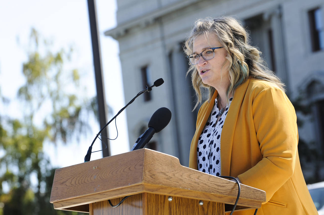 FILE - Jenna Banna, a mother from Missoula, Mont., speaks during a rally at the Montana Capitol in ...