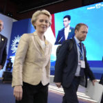 
              President of the European Commission Ursula von der Leyen, center left, walks after speaking at the COP27 U.N. Climate Summit, Tuesday, Nov. 8, 2022, in Sharm el-Sheikh, Egypt. European Council President Charles Michel is at left. (AP Photo/Peter Dejong)
            