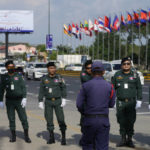
              Police officers pose for a souvenir in a group photo as they guard near the Phnom Penh International Airport for the upcoming Association of Southeast Asian Nations (ASEAN) summits in Phnom Penh, Cambodia, Tuesday, Nov. 8, 2022. Southeast Asian leaders convene in the Cambodian capital Thursday, faced with the challenge of trying to curtail escalating violence in Myanmar while the country’s military-led government shows no signs of complying with the group’s peace plan. (AP Photo/Heng Sinith)
            
