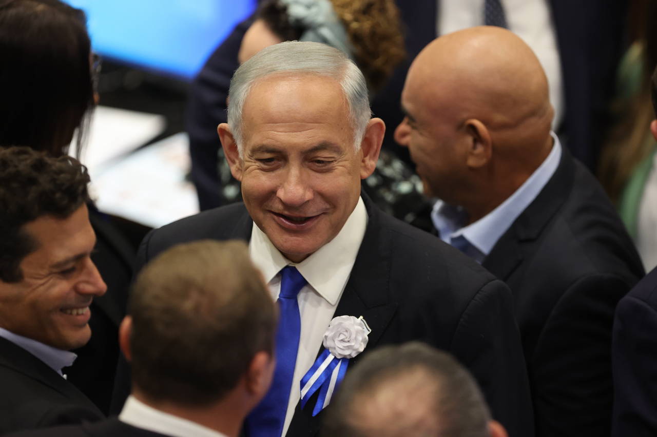 FILE - Israel's Likud Party leader Benjamin Netanyahu arrives for the swearing-in ceremony of Israe...