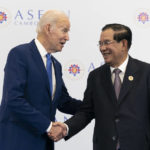
              FILE - U.S. President Joe Biden shakes hands with Cambodian Prime Minister Hun Sen before their meeting during the Association of Southeast Asian Nations (ASEAN) summit, Saturday, Nov. 12, 2022, in Phnom Penh, Cambodia. Hun Sen said Tuesday, Nov. 15, 2022, he has tested positive for COVID-19 at the Group of 20 meetings in Bali, just days after hosting many world leaders, including President Joe Biden, for a summit in Phnom Penh. (AP Photo/Alex Brandon, File)
            