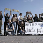 
              Climate activists participate in a demonstration holding a sign that reads "don't be scared of climate justice" at the designated protest zone for the COP27 U.N. Climate Summit, Tuesday, Nov. 15, 2022, in Sharm el-Sheikh, Egypt. (AP Photo/Nariman El-Mofty)
            