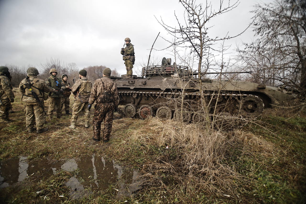Ukrainian servicemen take positions on the frontline at an undisclosed location in the Donetsk regi...