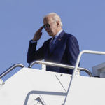 
              President Joe Biden returns a salute before boarding Air Force One, Thursday, Nov. 3, 2022, at Andrews Air Force Base, Md. Biden is en route to Albuquerque, N.M., to begin a four-state, three-day campaign swing. (AP Photo/Patrick Semansky)
            