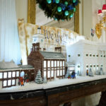 
              A sugar cookie replica of Independence Hall and a gingerbread replica of the White House are on display in the State Dining Room of the White House during a press preview of holiday decorations at the White House, Monday, Nov. 28, 2022, in Washington. (AP Photo/Patrick Semansky)
            