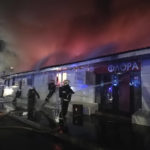 
              In this handout photo released by the Russian Emergency Ministry Press Service, firefighters try to extinguish a fire at a cafe in Kostroma 340 kilometers (210 miles) north of Moscow, Russia, Saturday, Nov. 5, 2022. Russian authorities say a fire in a cafe in the Russian city of Kostroma killed 15 people and injured five others. The blaze erupted in the early hours after someone apparently used a flare gun during a dispute. Rescuers were able to evacuate 250 people. (Russian Emergency Ministry Press Service via AP)
            