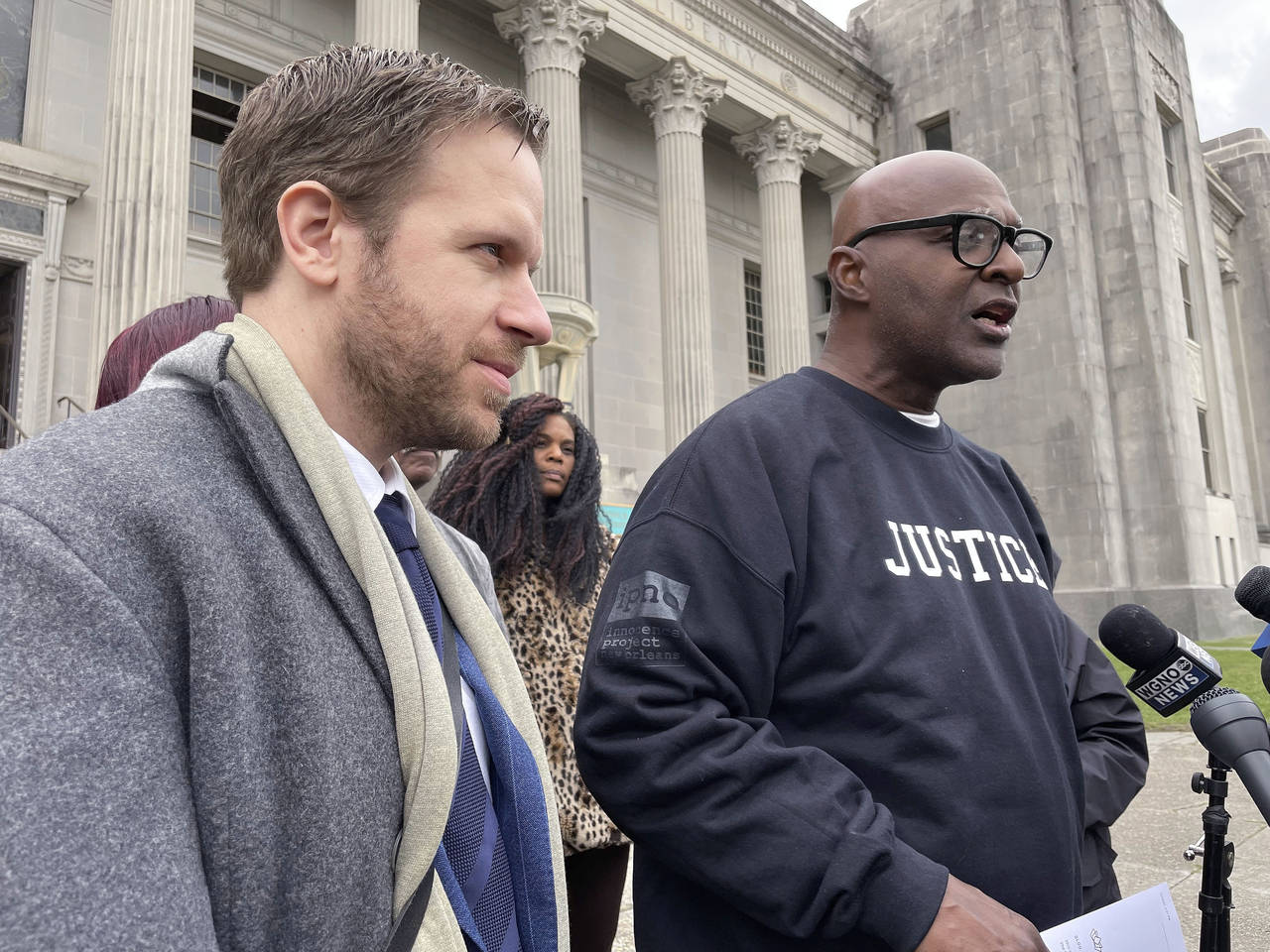 Attorney Richard Davis, left, of the Innocence Project New Orleans, stands next to Raymond Flanks o...