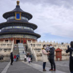 
              A family poses for photos at the Temple of Heaven in Beijing, Saturday, Nov. 12, 2022. The world's population is projected to hit an estimated 8 billion people on Tuesday, Nov. 15, according to a United Nations projection. (AP Photo/Mark Schiefelbein)
            