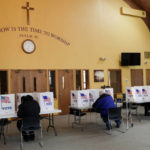 
              Voters cast their ballots at Christ's Family Church, Tuesday, Nov. 8, 2022, in Davenport, Iowa.  (Nikos Frazier/Quad City Times via AP)
            