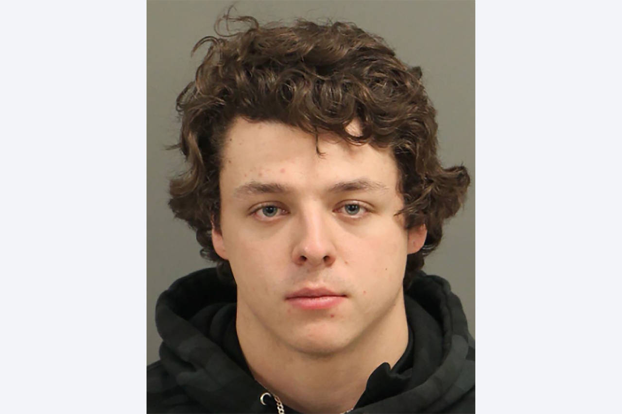 This booking photo released by the Raleigh Police Department shows Landen Christopher Glass. Glass ...