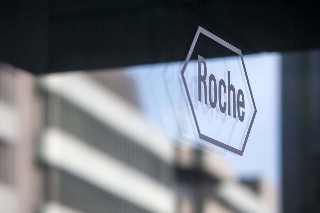 FILE - The logo of the pharmaceutical company Roche is pictured during an annual news conference in...
