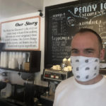 
              FILE - In this April 17, 2020, photo, Zachary Davis poses for a photo at The Penny Ice Creamery in Santa Cruz, Calif. California has officially recovered all of the 2.7 million jobs it lost at the start of the pandemic. State officials said Friday, Nov. 18, 2022, the state added 56,700 new jobs in October. Davis, who co-owns four ice cream locations and a cafe in the beach town of Santa Cruz, laid off 70 of his 75 employees at the start of the pandemic. Today, they have 85 workers. (AP Photo/Martha Mendoza,File)
            