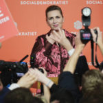 
              Denmark's Prime Minister and head of the the Social Democratic Party Mette Frederiksen gestures during the country's general election night at the party's office in Copenhagen, Denmark, Tuesday, Nov. 1, 2022. (Martin Sylvest/Ritzau Scanpix via AP)
            