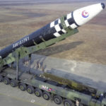 
              This photo provided on Nov. 19, 2022, by the North Korean government shows what it says a Hwasong-17 intercontinental ballistic missile before its test firing at Pyongyang International Airport in Pyongyang, North Korea, Friday, Nov. 18, 2022. Independent journalists were not given access to cover the event depicted in this image distributed by the North Korean government. The content of this image is as provided and cannot be independently verified. Korean language watermark on image as provided by source reads: "KCNA" which is the abbreviation for Korean Central News Agency. (Korean Central News Agency/Korea News Service via AP)
            