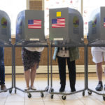 
              People cast their ballots at Coit Arts Academy in Grand Rapids on Tuesday, Nov. 8, 2022. (Joel Bissell/The Grand Rapids Press via AP)
            