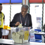 
              Former Malaysian Prime Minister and Gerakan Tanah Air (Homeland Party) chairman Mahathir Mohamad casts his votes at a voting center during the general elections in Alor Setar, Kedah, Malaysia, Saturday, Nov. 19, 2022. Malaysians have begun casting ballots in a tightly contested national election that will determine whether the country’s longest-ruling coalition can make a comeback after its electoral defeat four years ago.  (AP Photo/JohnShen Lee)
            