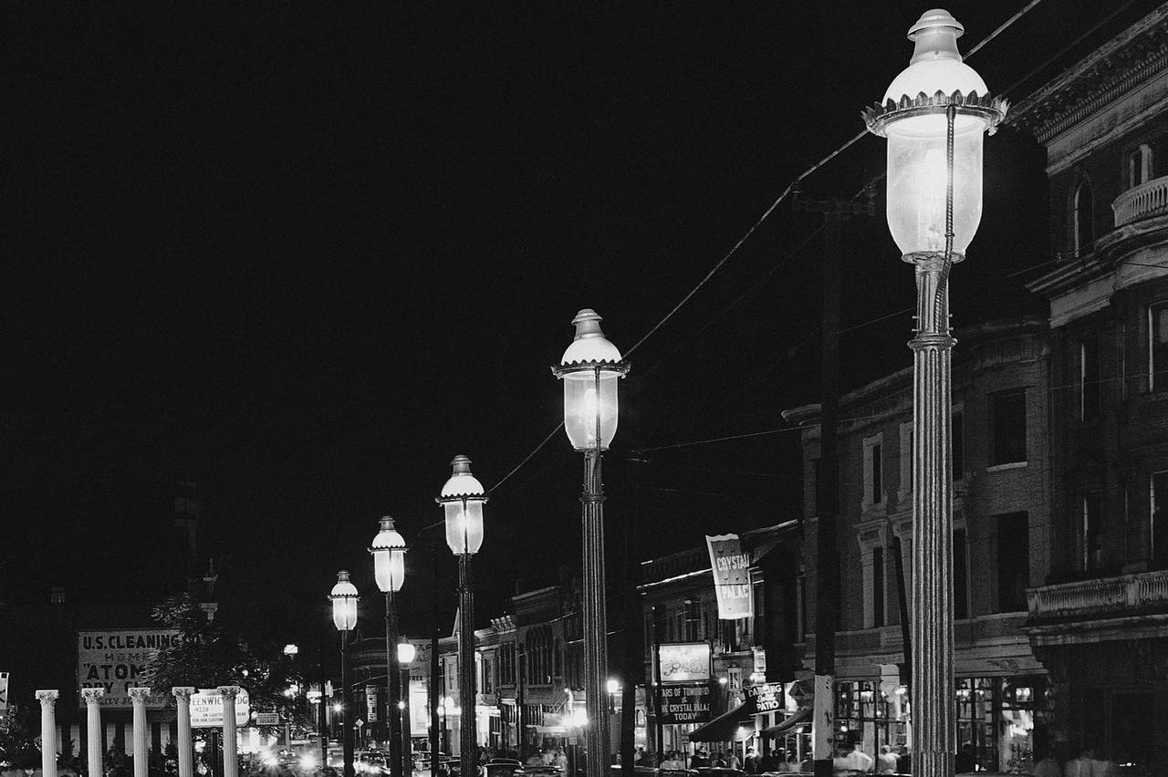 FILE - Gas lamps illuminate St. Louis' Gaslight Square on April 2, 1962. "Gaslighting" — mind man...