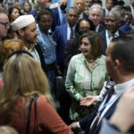 
              Speaker of the House Nancy Pelosi, D-Calif., talks with attendees as she walks through crowds at the COP27 U.N. Climate Summit, Thursday, Nov. 10, 2022, in Sharm el-Sheikh, Egypt. (AP Photo/Peter Dejong)
            
