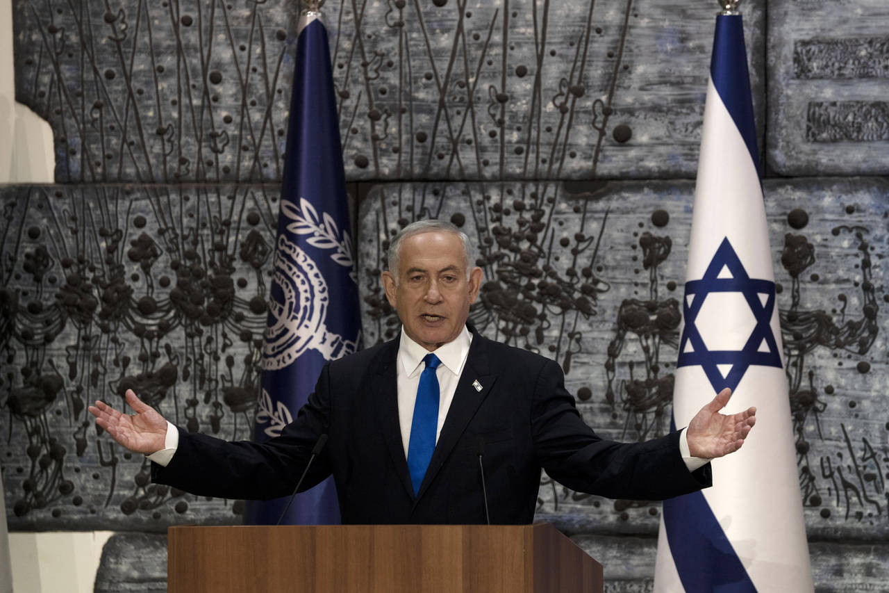 Israel's Likud Party leader Benjamin Netanyahu makes a statement after Israel's President Isaac Her...