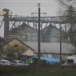
              Police officers work outside a grain depot where, according to the Polish government, an explosion of a Russian-made missile killed two people in Przewodow, Poland, Wednesday, Nov. 16, 2022. Poland said Wednesday that a Russian-made missile fell in the country’s east, killing two people, though U.S. President Joe Biden said it was "unlikely” it was fired from Russia. (AP Photo/Michal Dyjuk)
            