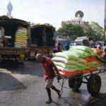 
              Laborers transport a cart load of rice sacks at a market place in Colombo, Sri Lanka, Monday, Nov. 14, 2022. (AP Photo/Eranga Jayawardena)
            