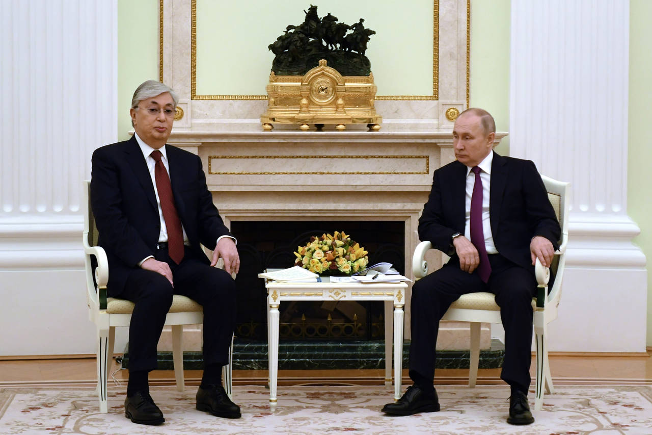 Russia's President Vladimir Putin, right, and Kazakhstan's President Kassym-Jomart Tokayev pose for...