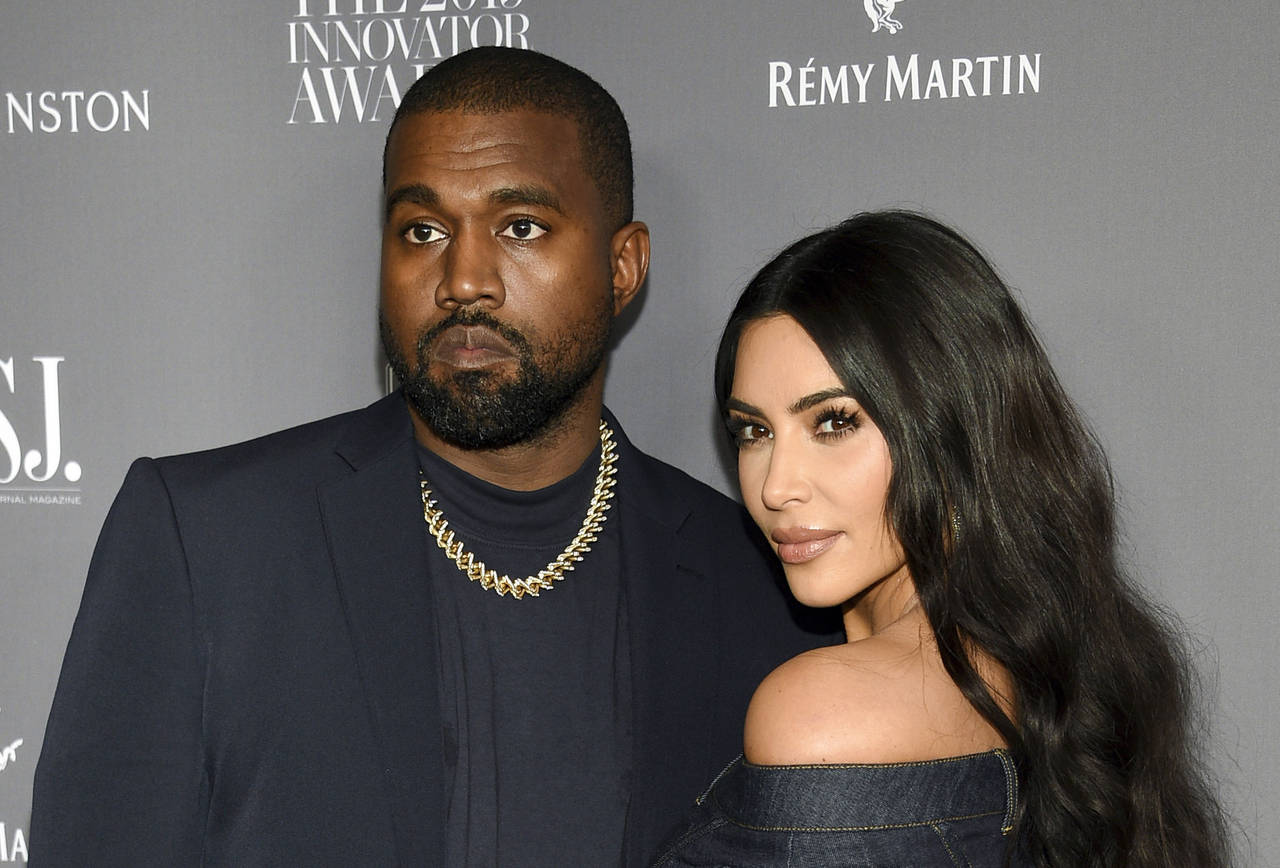 FILE - Kanye West, left, and Kim Kardashian attend the WSJ. Magazine Innovator Awards on Nov. 6, 20...