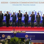 
              From left to right; Philippine's President Ferdinand Marcos, Jr., Singapore's Prime Minister Lee Hsien Loong, Thailand's Prime Minister Prayuth Chan-ocha, Vietnam's Prime Minister Pham Minh Chinh, Canada's Prime Minister Justin Trudeau, Cambodia's Prime Minister Hun Sen, Indonesia's President Joko Widodo, Brunei's Sultan Hassanal Bolkiah, Laos' Prime Minister Phankham Viphavanh, and Malaysian Speaker of the House of Representatives Azhar Azizan Harun wave for a group photo during the ASEAN - Canada. summit in Phnom Penh, Cambodia, Saturday, Nov. 12, 2022. (AP Photo/Anupam Nath)
            