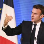 
              France's President Emmanuel Macron delivers a speech to heads of the country's most climate-damaging industries, at the Elysee Palace, in Paris, Tuesday, Nov. 8, 2022. Just back from the U.N. climate summit in Egypt, French President Emmanuel Macron is to meet Tuesday with the heads of the country's most climate-damaging industries to pressure them to reduce greenhouse gases emissions, amid growing competition from the U.S. and China. (Mohammed Badra, Pool Photo via AP)
            