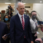 
              Sen. Rick Scott, R-Fla., walks to the Senate subway after voting on a bill that would enshrine same-sex and interracial marriages into federal law, Wednesday, Nov. 16, 2022, on Capitol Hill in Washington. (AP Photo/Patrick Semansky)
            
