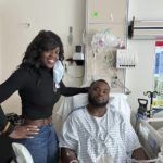 
              This image provided by Brenda Hollins by Gordon McKernan shows Mike Hollins, right, and his mother, Brenda Hollins, at University of Virginia Medical Center in Charlottesville, Va., on Wednesday, Nov. 17, 2022. Mike Hollins was shot and wounded on the school’s campus on Sunday, Nov. 13. Three of his teammates on the university’s football team were fatally shot during the incident. (Brenda Hollins and Gordon McKernan via AP)
            