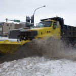 
              A snow plow clears snow from the road on Friday, Nov. 18, 2022, in Buffalo, N.Y.  A dangerous lake-effect snowstorm paralyzed parts of western and northern New York, with nearly 2 feet of snow already on the ground in some places and possibly much more on the way.  (AP Photo/Joshua Bessex)
            