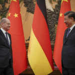 
              Chinese President Xi Jinping, right, and German Chancellor Olaf Scholz meet at the Great Hall of the People in Beijing, China, Friday, Nov. 4, 2022. (Kay Nietfeld/Pool Photo via AP)
            
