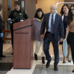 
              Assistant State Attorney Mike Satz, center, along with family members of the victims walks into court for the sentencing hearing for Marjory Stoneman Douglas High School shooter Nikolas Cruz at the Broward County Courthouse in Fort Lauderdale, Fla., on Wednesday, Nov. 2, 2022.  Cruz was sentenced to life in prison for murdering 17 people at Parkland's Marjory Stoneman Douglas High School more than four years ago. (Mike Stocker/South Florida Sun Sentinel via AP, Pool)
            