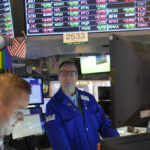 
              Traders work on the floor at the New York Stock Exchange in New York, Monday, Nov. 28, 2022. (AP Photo/Seth Wenig)
            