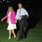 
              President Joe Biden and first lady Jill Biden arrive on the South Lawn of the White House after attending a campaign rally for Maryland gubernatorial candidate Wes Moore, Monday, Nov. 7, 2022, in Washington. (AP Photo/Evan Vucci)
            