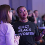 
              Democratic candidate for Georgia Governor Stacey Abrams supporter Perri Chandler wears an "Elect Black Women" T-shirt during an election night event for Abrams in Atlanta on Tuesday, Nov. 8, 2022. (AP Photo/Ben Gray)
            