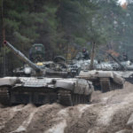 
              Ukrainian soldiers on captured Russian tanks T-72 hold military training close to the Ukraine-Belarus border near Chernihiv, Ukraine, Friday, Oct. 28, 2022. (AP Photo/Aleksandr Shulman)
            