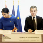 
              British Home Secretary Suella Braverman, left, and French Interior Minister Gerald Darmanin sign an agreement, at the Interior Ministry in Paris, France, Monday Nov. 14, 2022, to try to curb migration across the English Channel - a regular source of friction between the two countries. (Stefan Rousseau/Pool via AP)
            