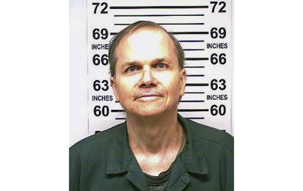 FILE - This photo provided by the New York State Department of Corrections shows Mark David Chapman...