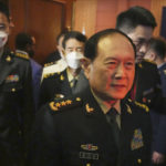 
              Chinese Defense Minister Gen. Wei Fenghe, front, walks out after a meeting with U.S. Secretary of Defense Lloyd J. Austin III at the venue of the Association of Southeast Asian Nations (ASEAN) Defense Ministers' Meeting (ADMM) in Siem Reap, Cambodia, Tuesday, Nov. 22, 2022. (AP Photo/Heng Sinith)
            